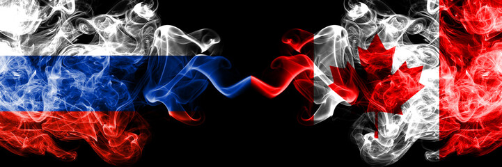 Russian vs Canada, Canadian smoke flags placed side by side. Thick colored silky smoke flags of Russia and Canada, Canadian