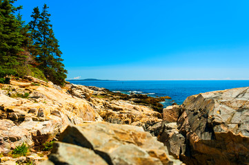 Fototapeta na wymiar Acadia National Park is Atlantic coast recreation area. Its landscape is marked by woodland, rocky beaches and glacier-scoured granite peaks such as Cadillac Mountain, the highest point on the United 