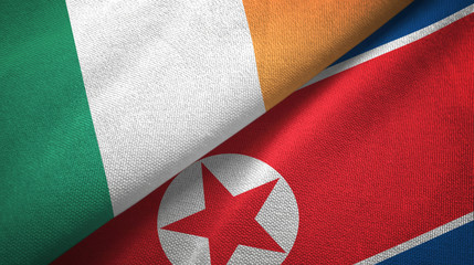 Ireland and North Korea two flags textile cloth, fabric texture