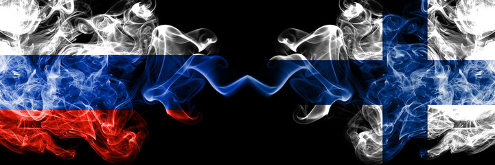 Russian vs Finland, FInnish smoke flags placed side by side. Thick colored silky smoke flags of Russia and Finland, FInnish