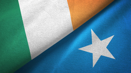 Ireland and Somalia two flags textile cloth, fabric texture
