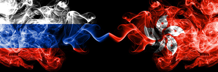 Russian vs Hong Kong, China smoke flags placed side by side. Thick colored silky smoke flags of Russia and Hong Kong, China