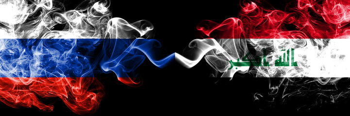 Russian vs Iraq, Iraqi smoke flags placed side by side. Thick colored silky smoke flags of Russia and Iraq, Iraqi