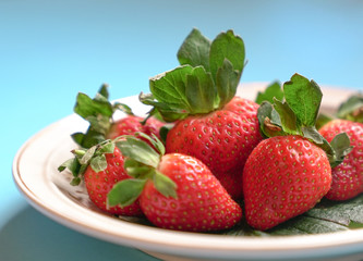 Juicy fresh strawberries on a plate