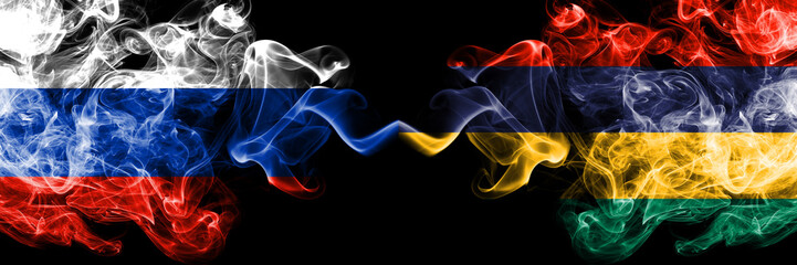 Russian vs Mauritius, Mauritian smoke flags placed side by side. Thick colored silky smoke flags of Russia and Mauritius, Mauritian