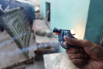 Shot of Toy Gun with flash on Diwali Occasion