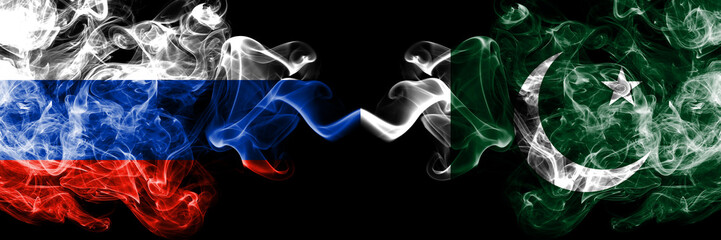 Russian vs Pakistan, Pakistani smoke flags placed side by side. Thick colored silky smoke flags of Russia and Pakistan, Pakistani
