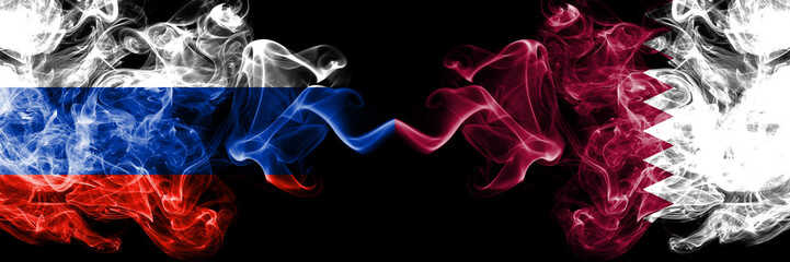 Russian vs Qatar, Qatari smoke flags placed side by side. Thick colored silky smoke flags of Russia and Qatar, Qatari