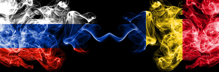 Russian vs Romania, Romanian smoke flags placed side by side. Thick colored silky smoke flags of Russia and Romania, Romanian