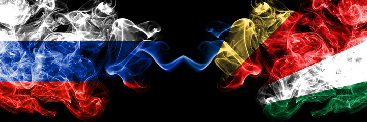 Russian vs Seychelles, Seychelloise smoke flags placed side by side. Thick colored silky smoke flags of Russia and Seychelles, Seychelloise