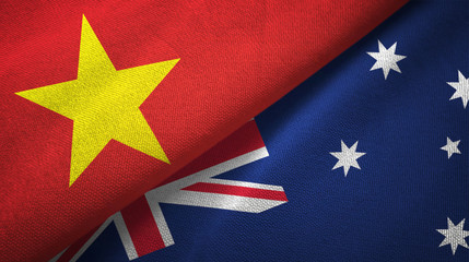 Vietnam and Australia two flags textile cloth, fabric texture