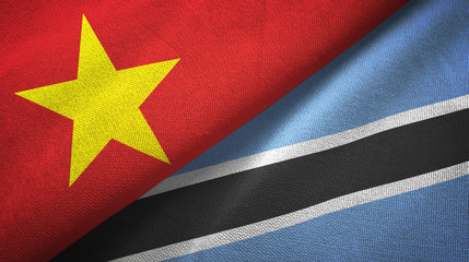 Vietnam and Botswana two flags textile cloth, fabric texture