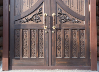 doors in an old wooden house after restoration close-up