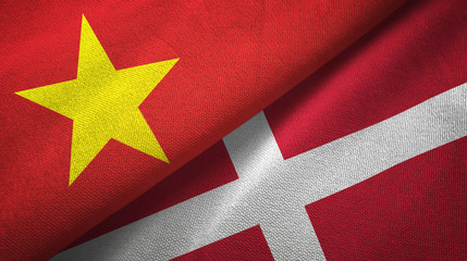 Vietnam and Denmark two flags textile cloth, fabric texture