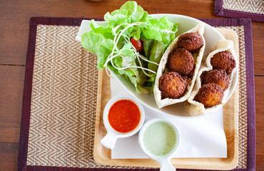 healthy dish of falafel with salad