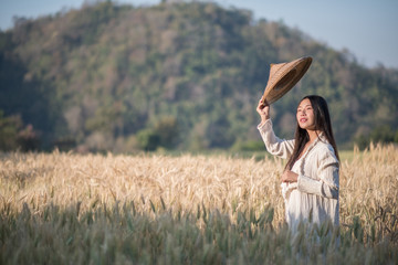 Vietnamese female farmer Wheat harvest