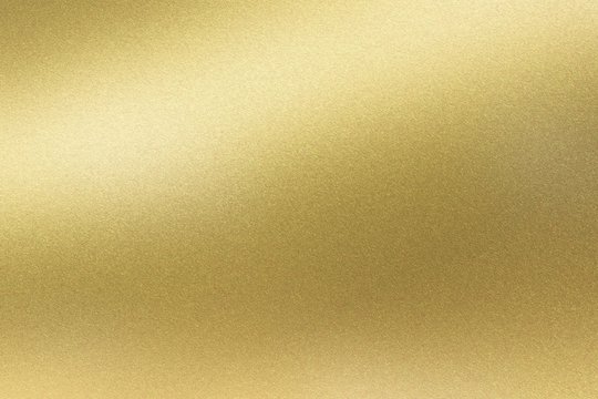 Abstract texture background, light shining on golden stainless wall