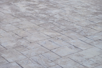 Perspective view rectangular cement tile on the ground in diagonal axis