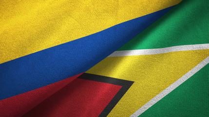 Colombia and Guyana two flags textile cloth, fabric texture