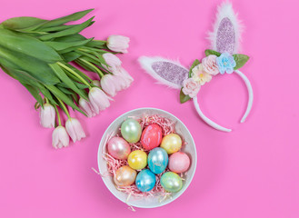 Happy Easter background with eggs, tulips and bunny ears