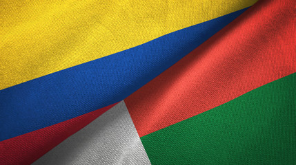 Colombia and Madagascar two flags textile cloth, fabric texture