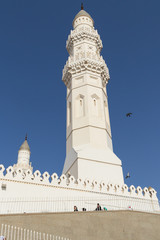 Mosque Tower with copy space bright blue sky