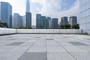 Panoramic skyline and buildings with empty square floor.