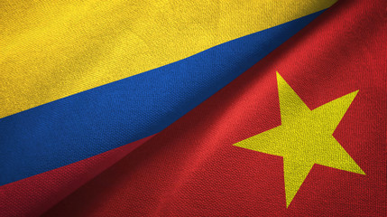 Colombia and Vietnam two flags textile cloth, fabric texture