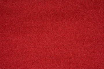 The texture of the knitted red fabric for the background 