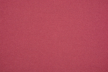 The texture of the knitted red fabric for the background 