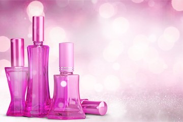 Aromatic Perfume bottles on background