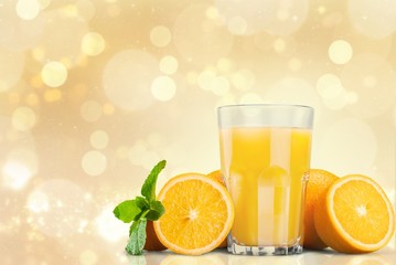 Orange juice and slices of orange on background © BillionPhotos.com