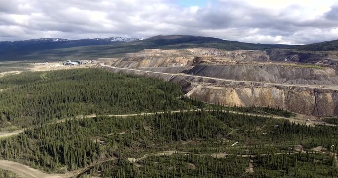 Aerial view of acid generating waste rock piles at an abandoned mine in northern Canada