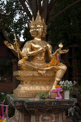 Chiang Mai Thailand, 4 headed golden statue of brahma in garden at Wat Lok Moli