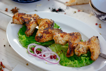 Chiken wings prepared on grill.