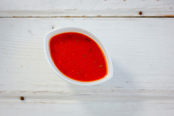 Red salsa, adjika or chatney sauce.