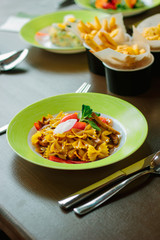 Farfale pasta served on a table ready to eat.