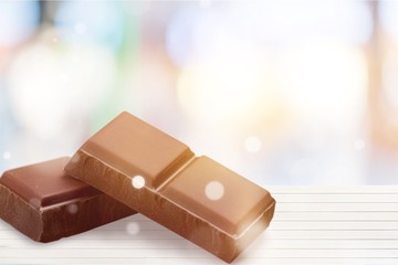 Two pieces of chocolate isolated on white background