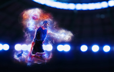 Acrobatic slam dunk of a basket player in the basket at the stadium