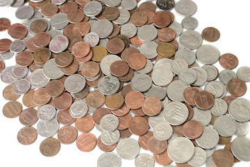 A pile of american cents scattered isolated on white
