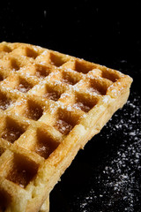 Waffles on a black background