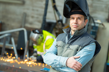 welder with mask posing