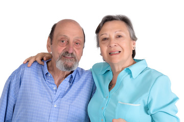 Portrait of happy senior couple looking at camera