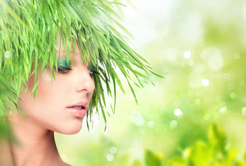 Nature beauty woman with fresh grass hair