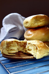 Freshly baked Filipino delicacy Pan de Coco or bread roll with sweetened coconut filling