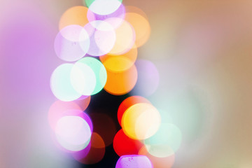 Fototapeta premium colorful christmas lights. bright bokeh. magical time. space for text. seasonal greetings concept. winter holidays