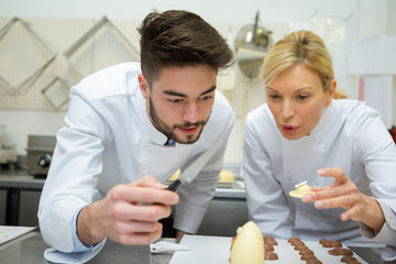 chocolate making apprentice focused on lesson