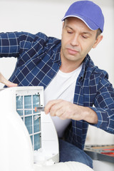 technician working on airconditioning