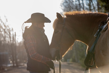 Woman horseback riding 