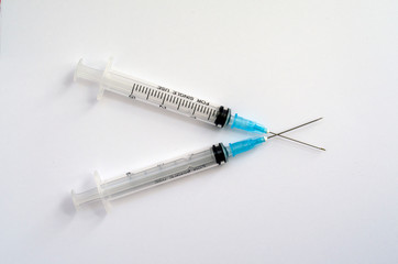 medical syringes on white background